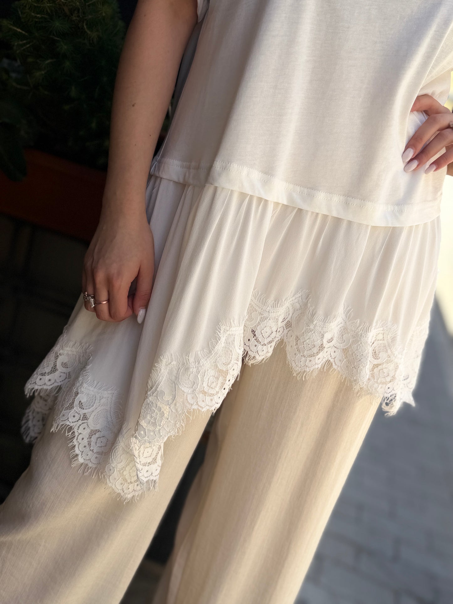Tensione in T-shirt con pizzo Bianca