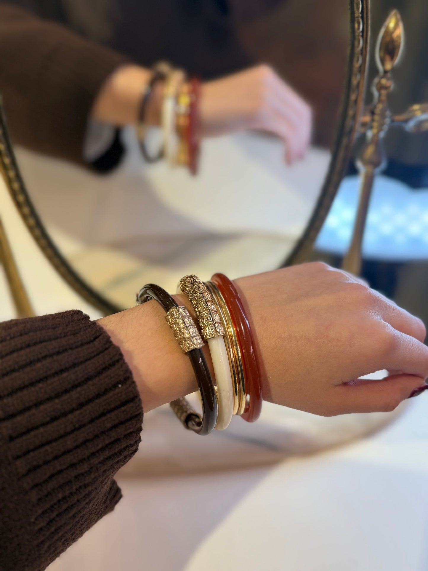 Set bracciali a cerchio rigidi con definiture ORO