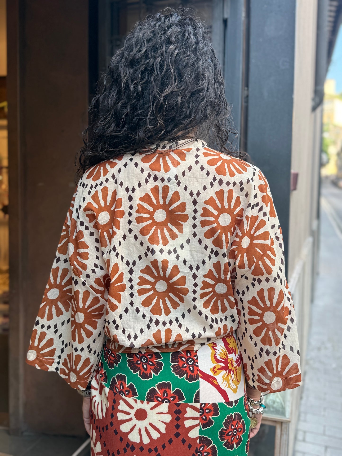 Tensione in camicia fantasia fiore MATTONE
