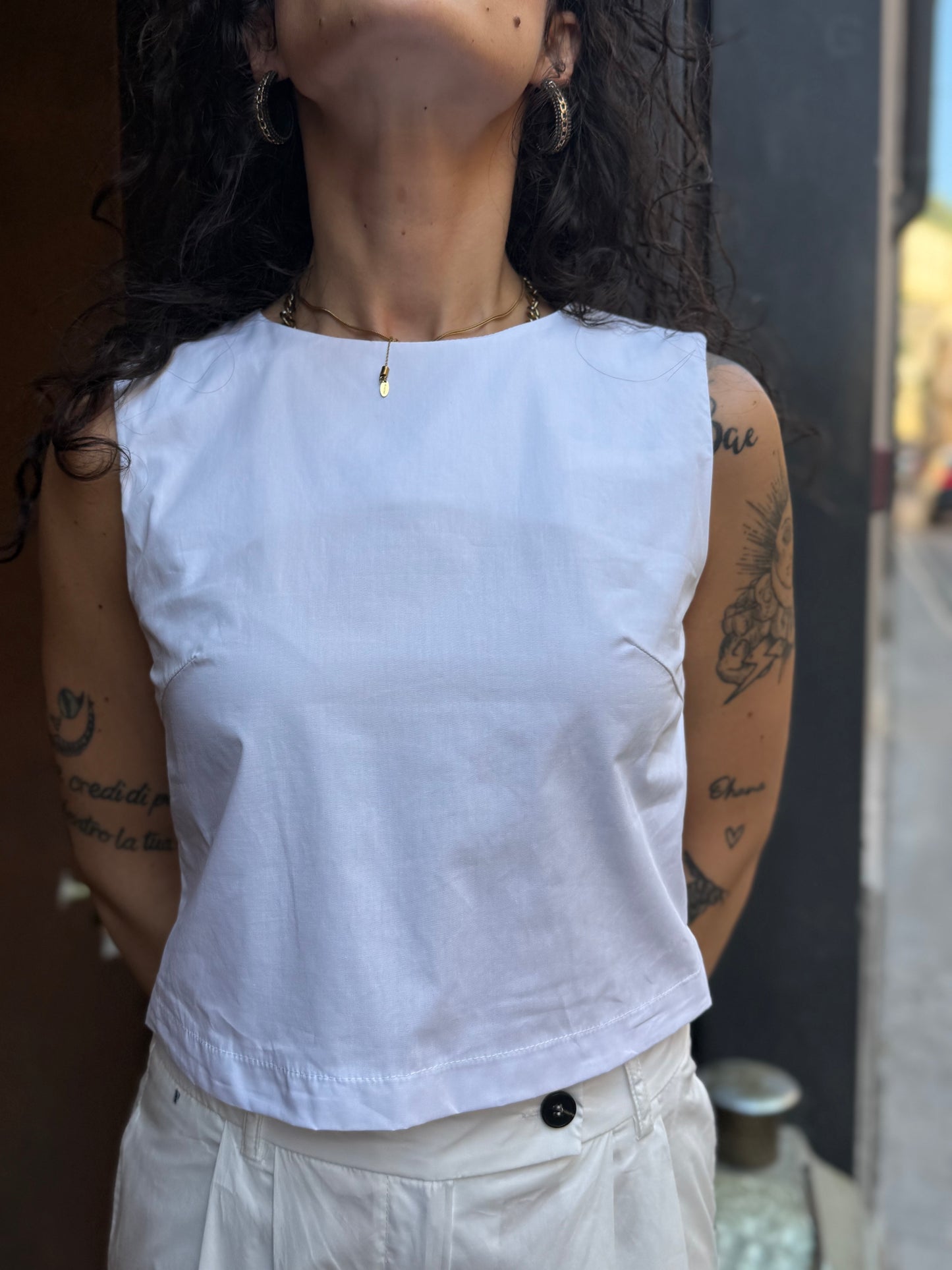 Tensione in Top Bianco