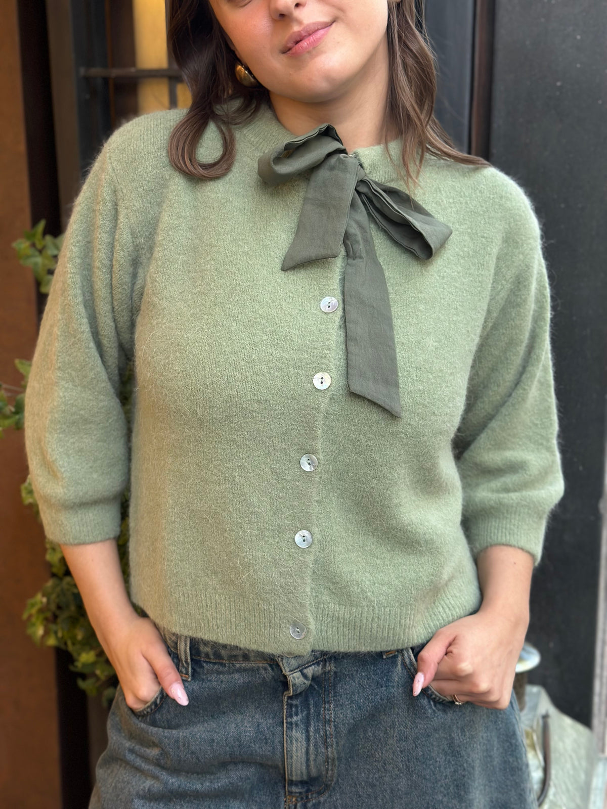 Cardigan con fiocco (disp. In più colori)