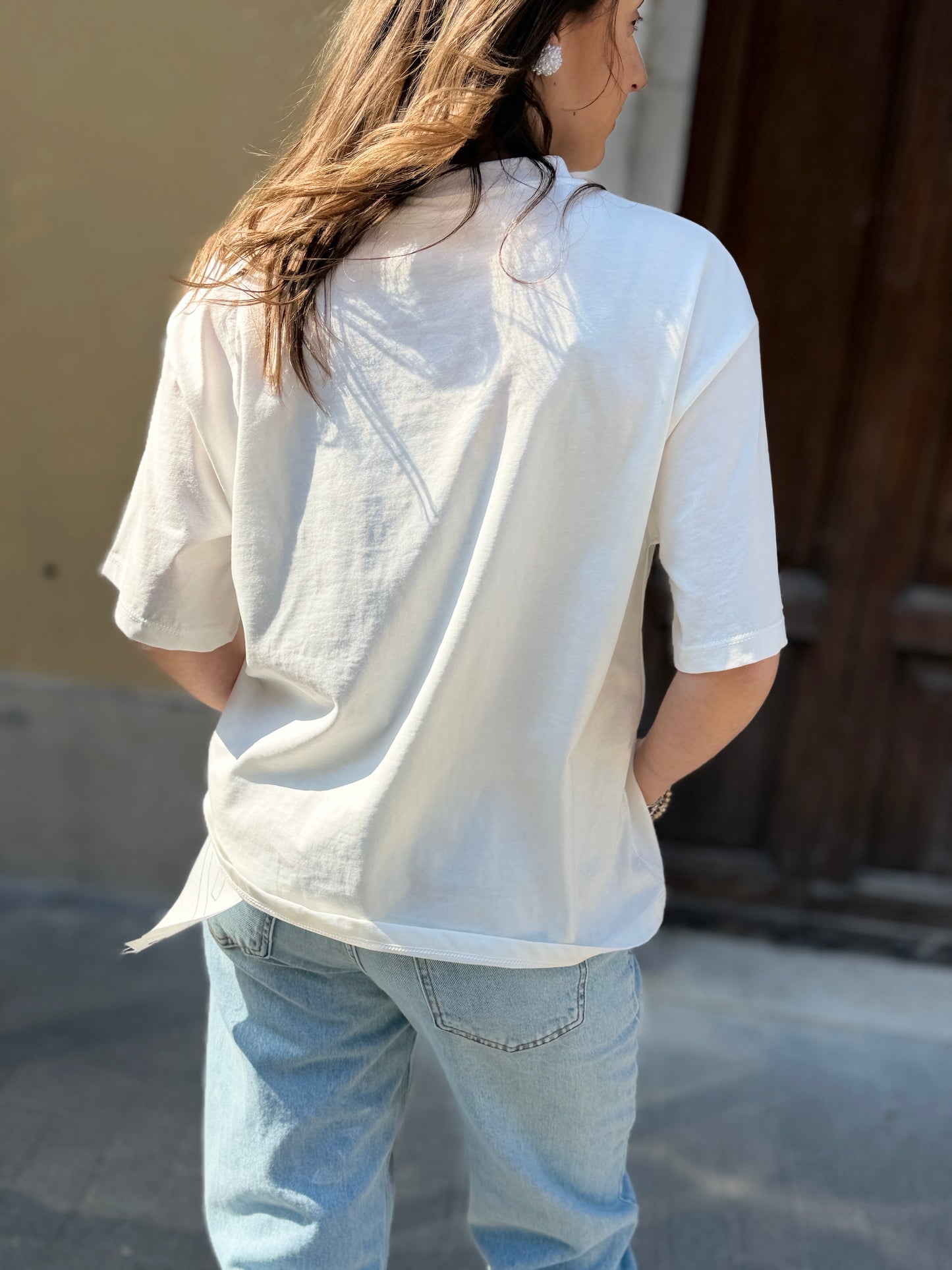 Tensione in T-shirt taschino paillettes