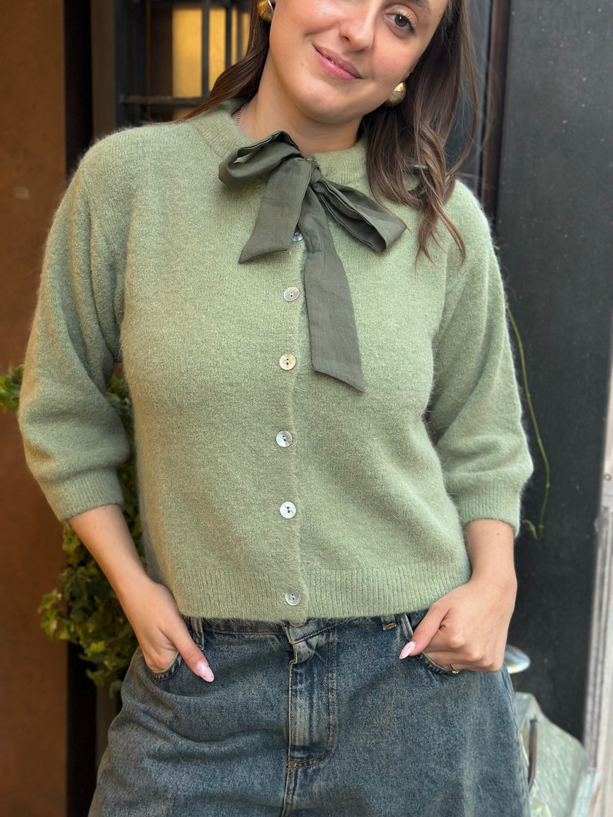 Cardigan con fiocco (disp. In più colori)