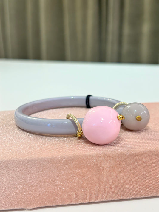 Bracciale rigido con ciondoli a sfere