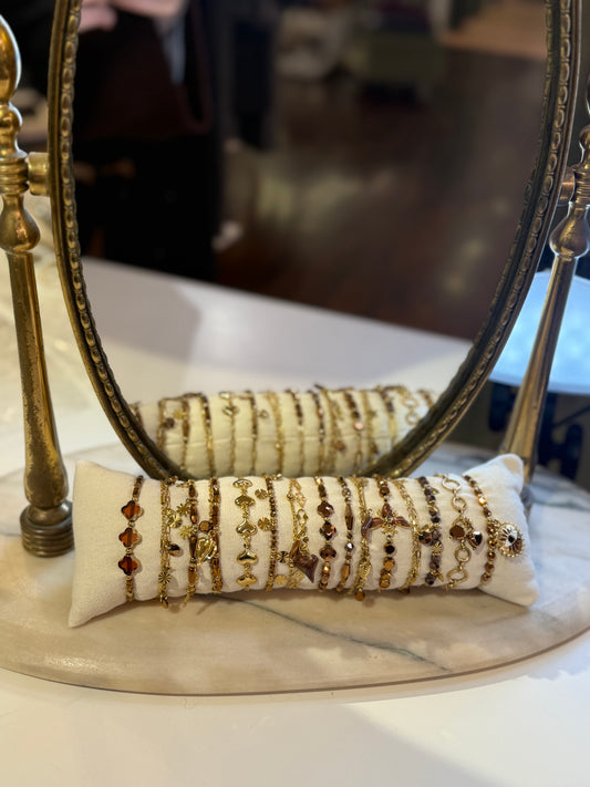 Bracciali ORO con perle geometriche in RAME e charm