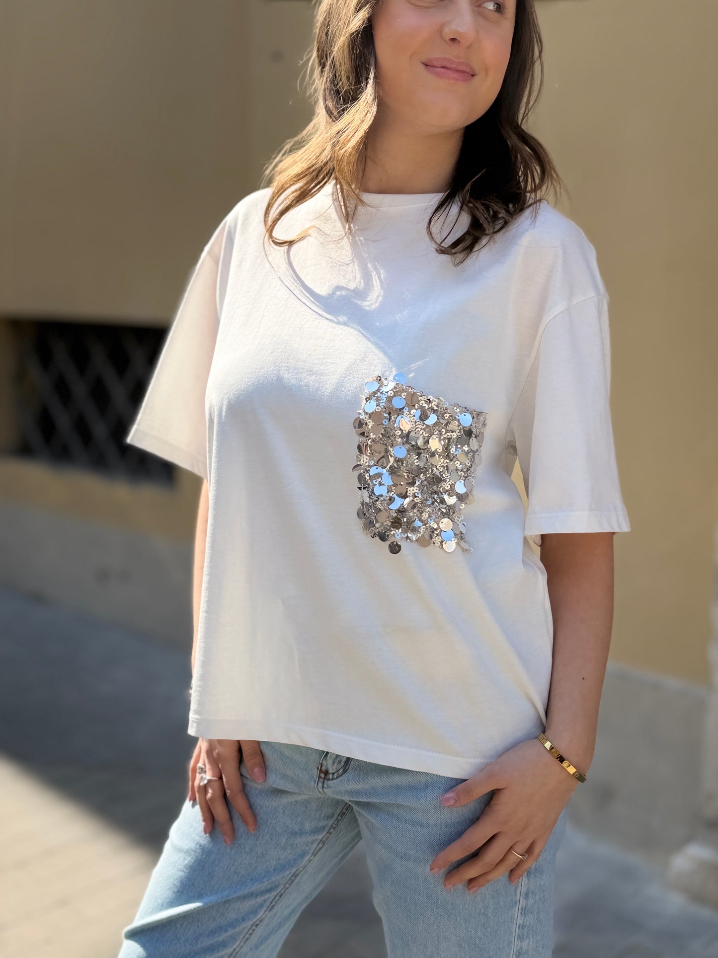Tensione in T-shirt taschino paillettes