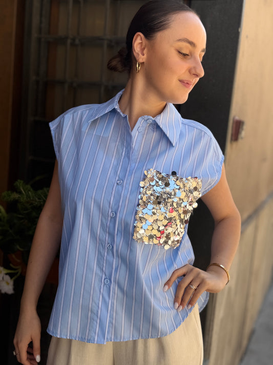 Tensione in camicia bacchettata con tasca  paillettes